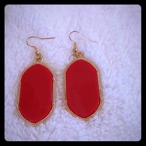 Red dangling earrings